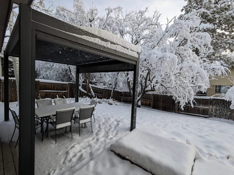 Nova Titan Pergola Aluminum Installation Stafford Midland Garden Furniture snow filled back gardne with the pergola with snow on roof, cold winter seen.jpg