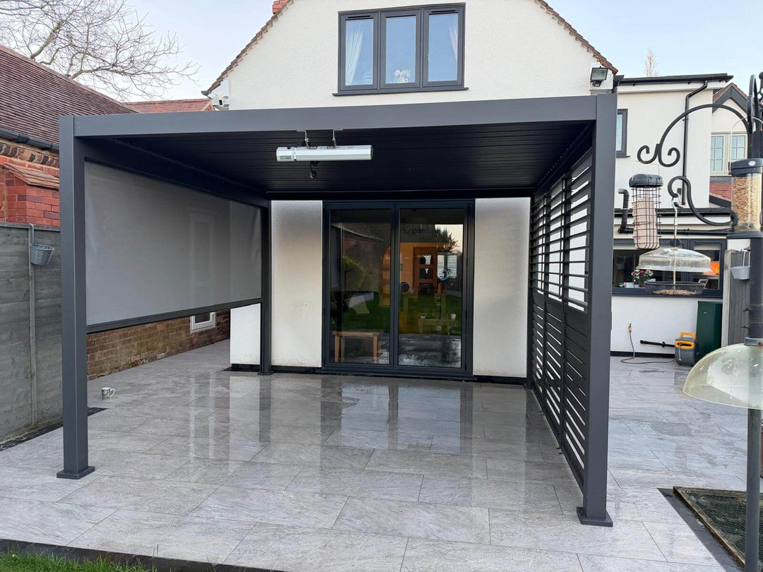 Nova Titan Pergola Installation in Taunton Somerset by Midland Garden Furniture Pergola with open close louvers against modern house on a rainy day with new tiled patio.