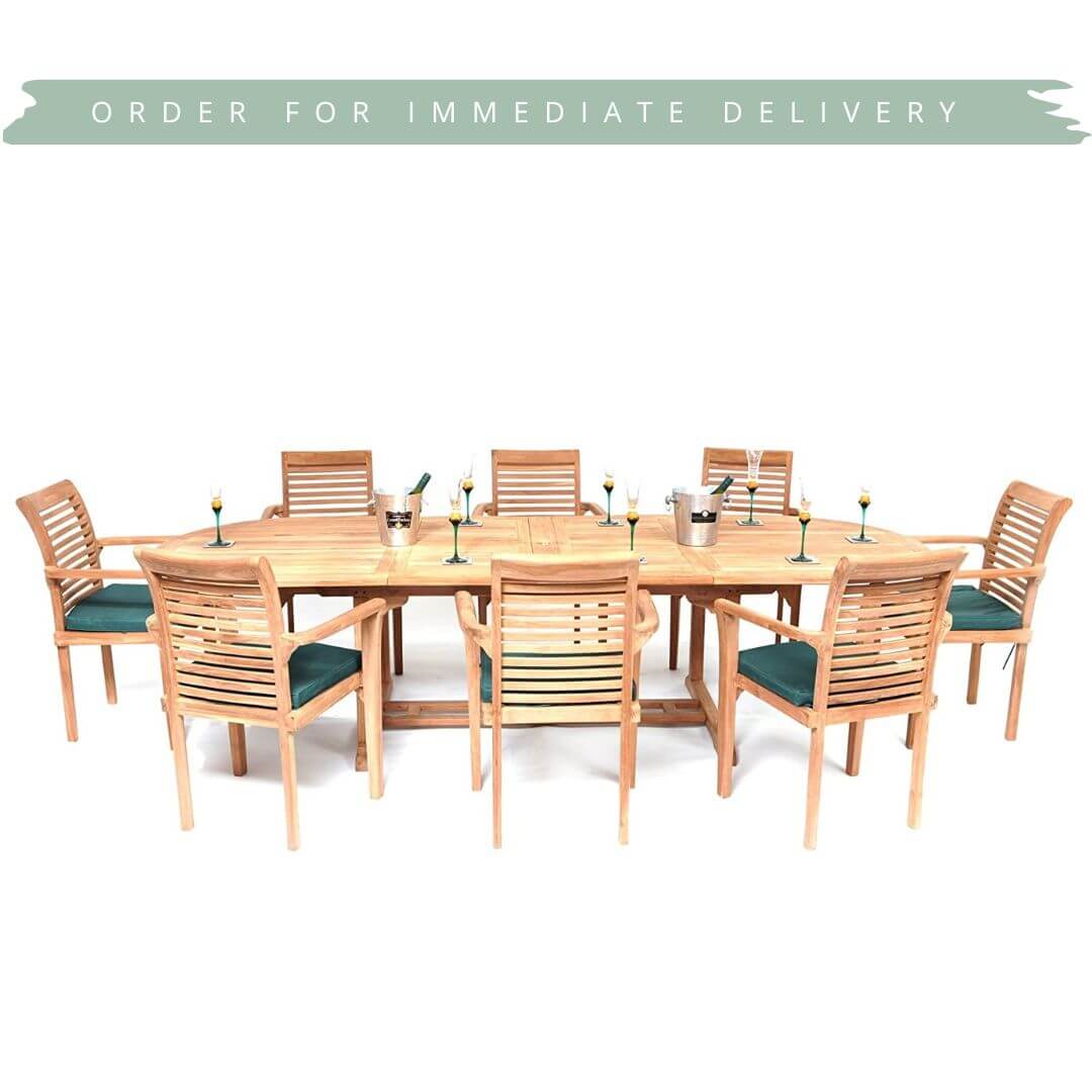 Hanover Teak Wooden outdoor dining set with 6 chairs and extending oval table on a white background from Midland Garden Furniture