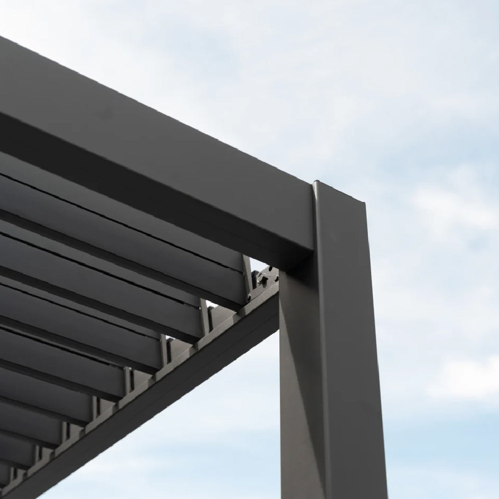 Top corner of a Nova Titan Grey Pergola showing how the roof louvers open and the precision of how the Pergola connects at its joints. 