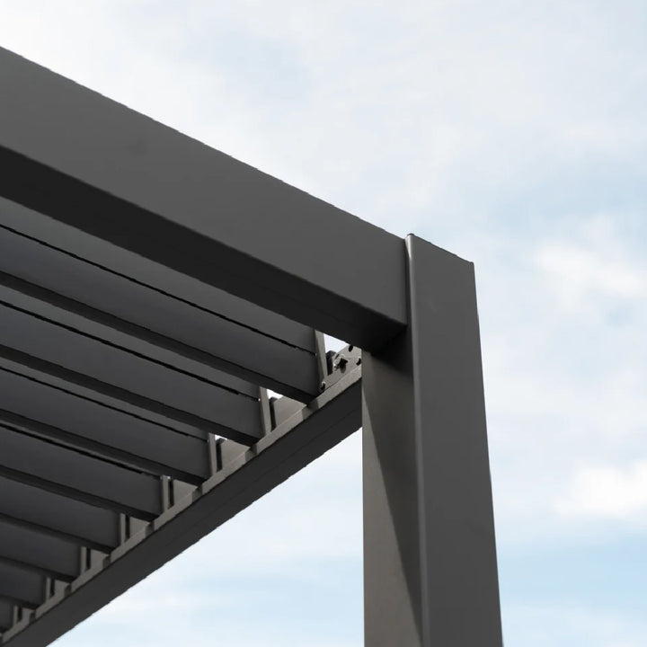 Top corner of a Nova Titan Grey Pergola showing how the roof louvers open and the precision of how the Pergola connects at its joints. 