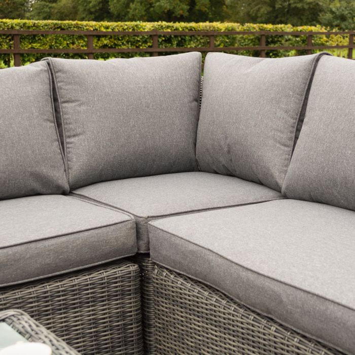 Bunbury Corner Garden Sofa Grey weave corner section in outdoor garden.
