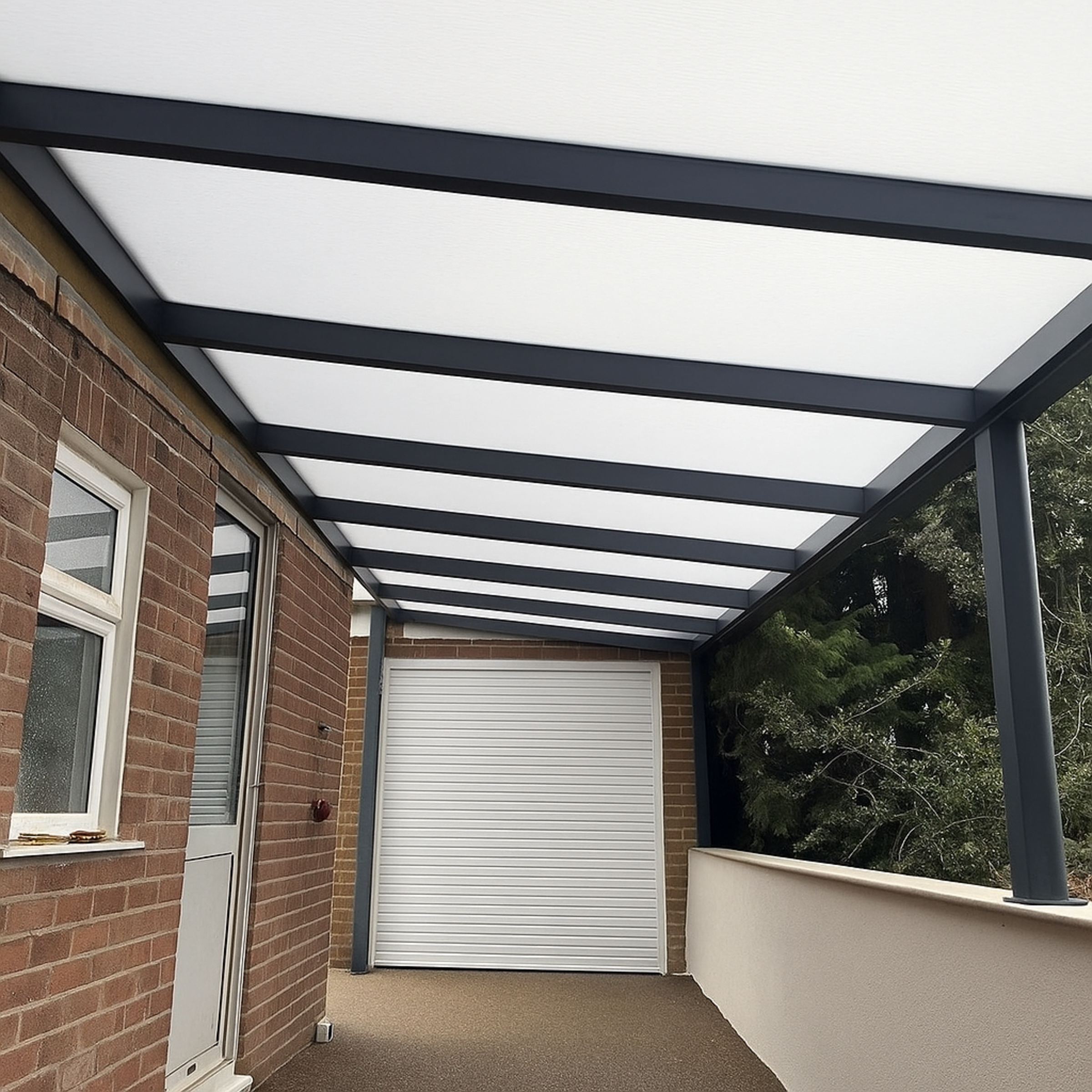 Deponti Veranda Carport installation Telford Shropshire from Midland Garden Furniture. Anthracite grey with opal roof.