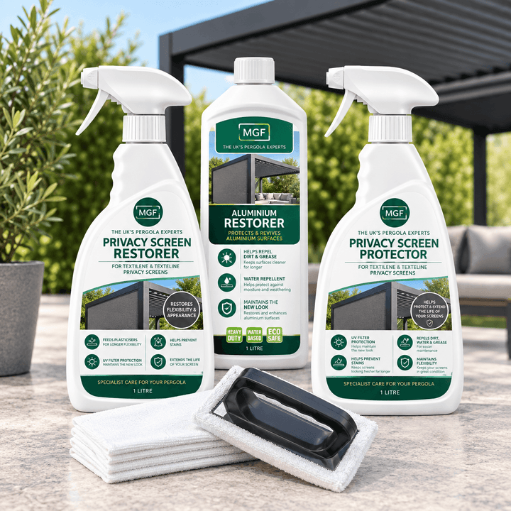 Three bottles of MGF Pergola Privacy Screen Restorer and Protector and Aluminium Restorer are displayed on a patio counter with a cleaning cloth and sponge in the foreground, set against a blurred outdoor background with Pergola at back with green bushes.