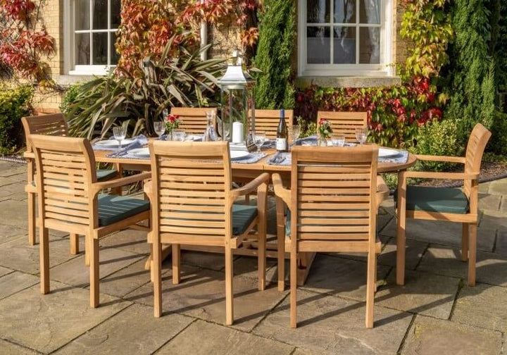 teak Outdoor dining set with wooden chairs and table on a patio