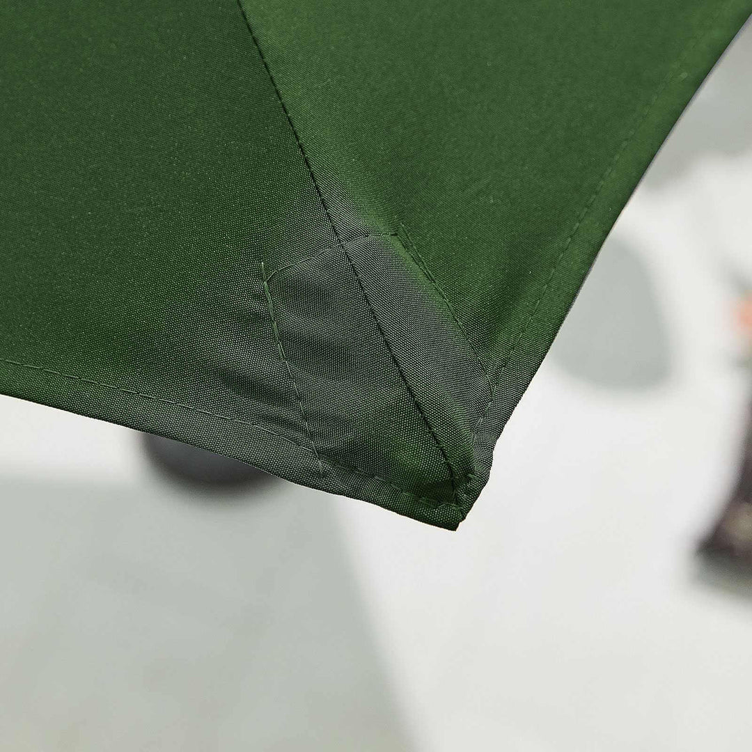 Close-up of a green fabric corner on a white background Nova Outdoor Living Parasol.