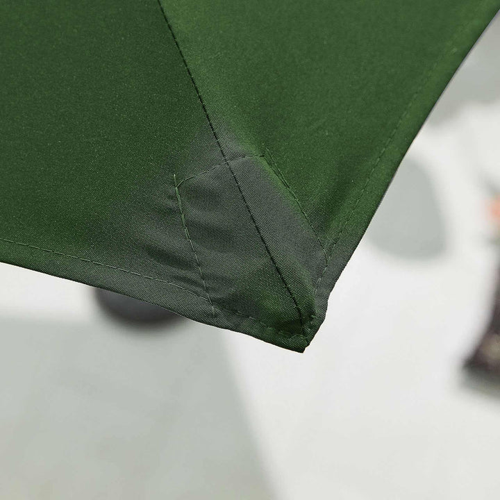 Close-up of a green fabric corner on a white background Nova Outdoor Living Parasol.