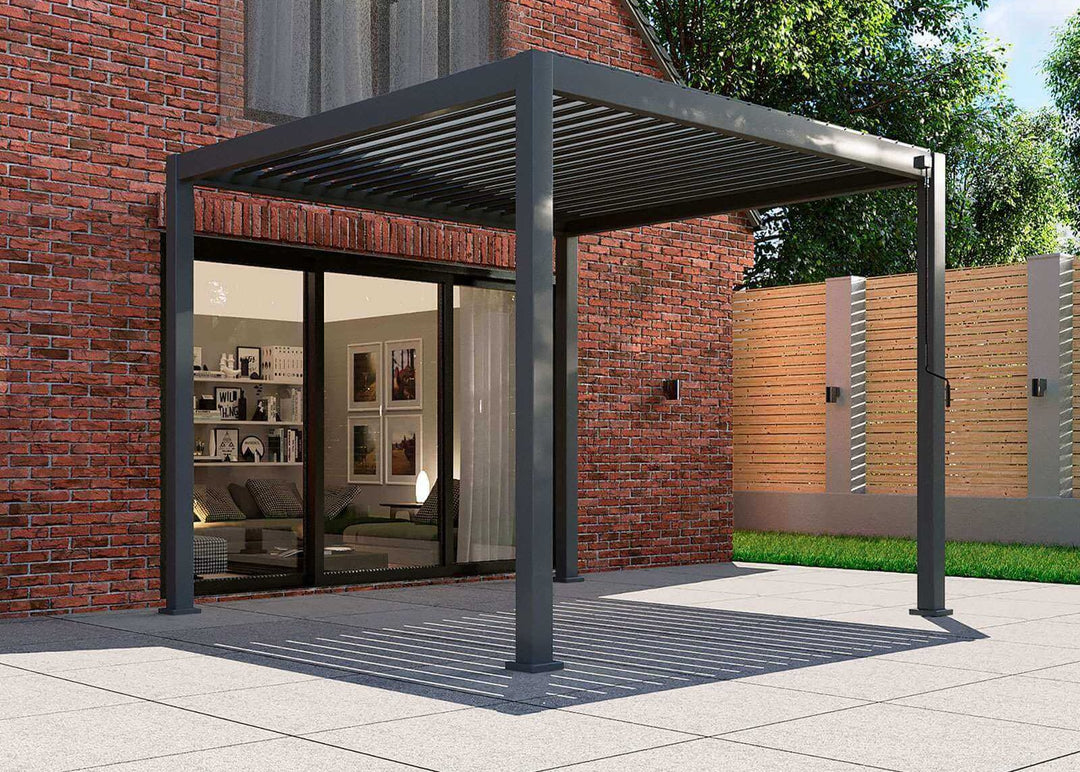 Titan Pergola 3M xc 3M Grey against brick house with sliding doors into pergola.
