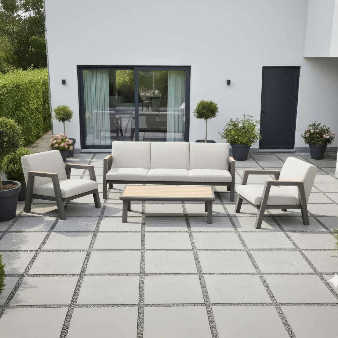 Nova Hunter Sofa set, outdoor patio set with sofa, chairs, and table on a tiled patio area.