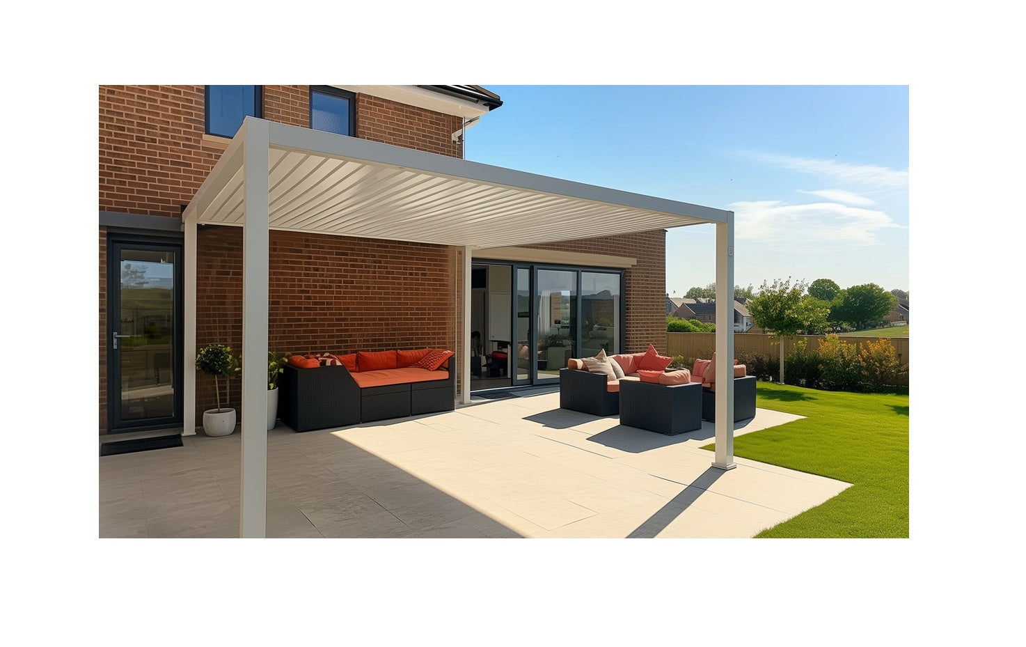 Nova Titan Pebble Pergola next to modern house on sunny day with orange and brown garden furniture 