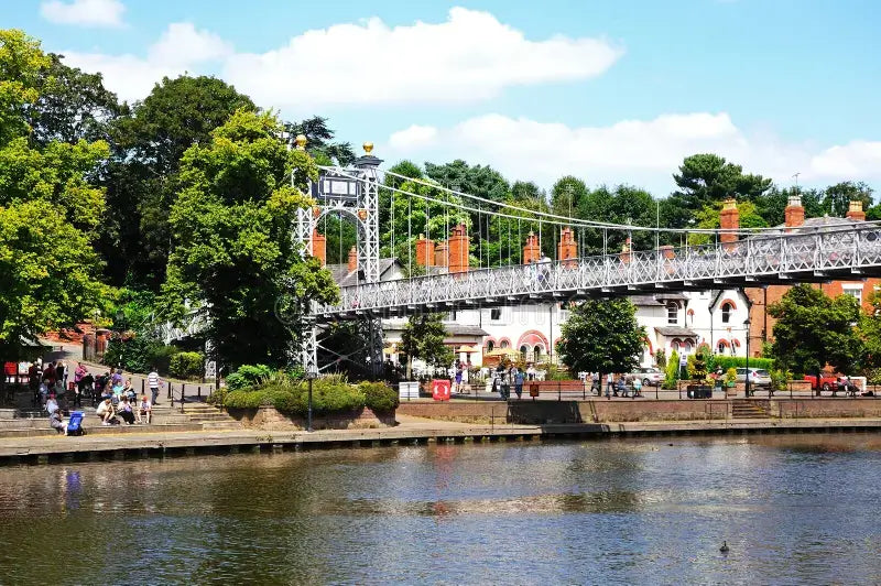 Pergola Installation Chester, Depicted by the Bridge over the river Dee with greenery and buildings in the background in Chester.